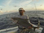 Staven with a small Amber Jack on Vertical Jig