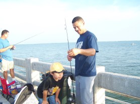 Christian inspecting another bait