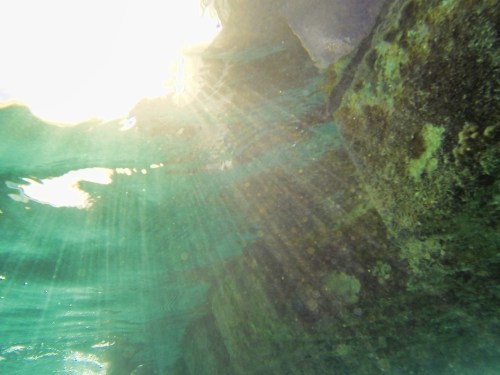 sun on the underwater rocks of St Maarten